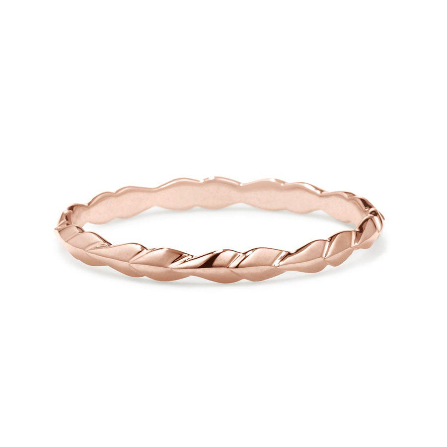 A tiny straight band with leaf like definition set in rose gold., Rose Gold