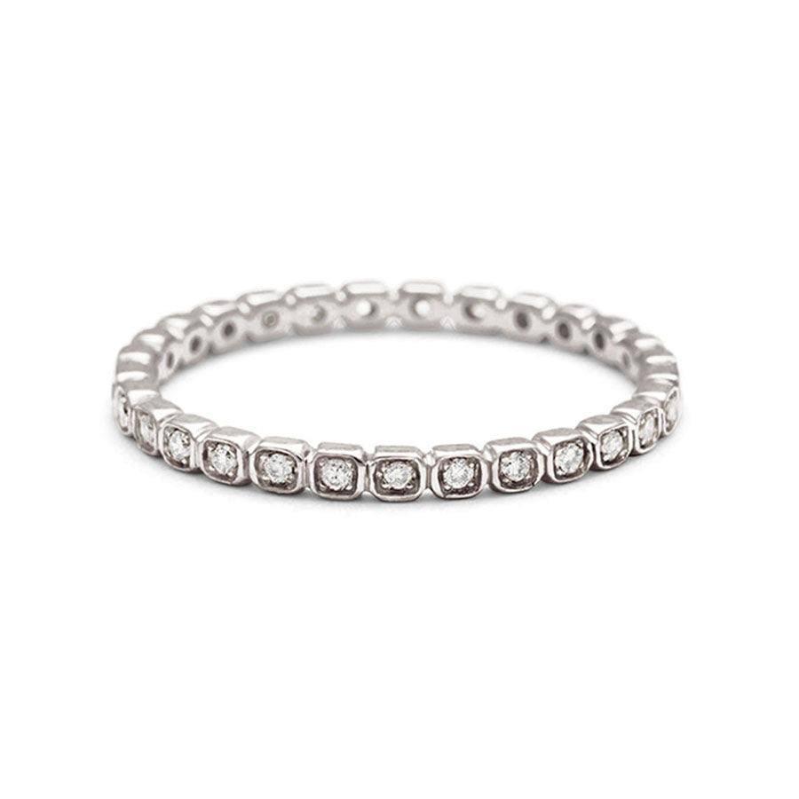 A straight band with tiny white diamonds set in eternity around the band set in white gold., White Gold