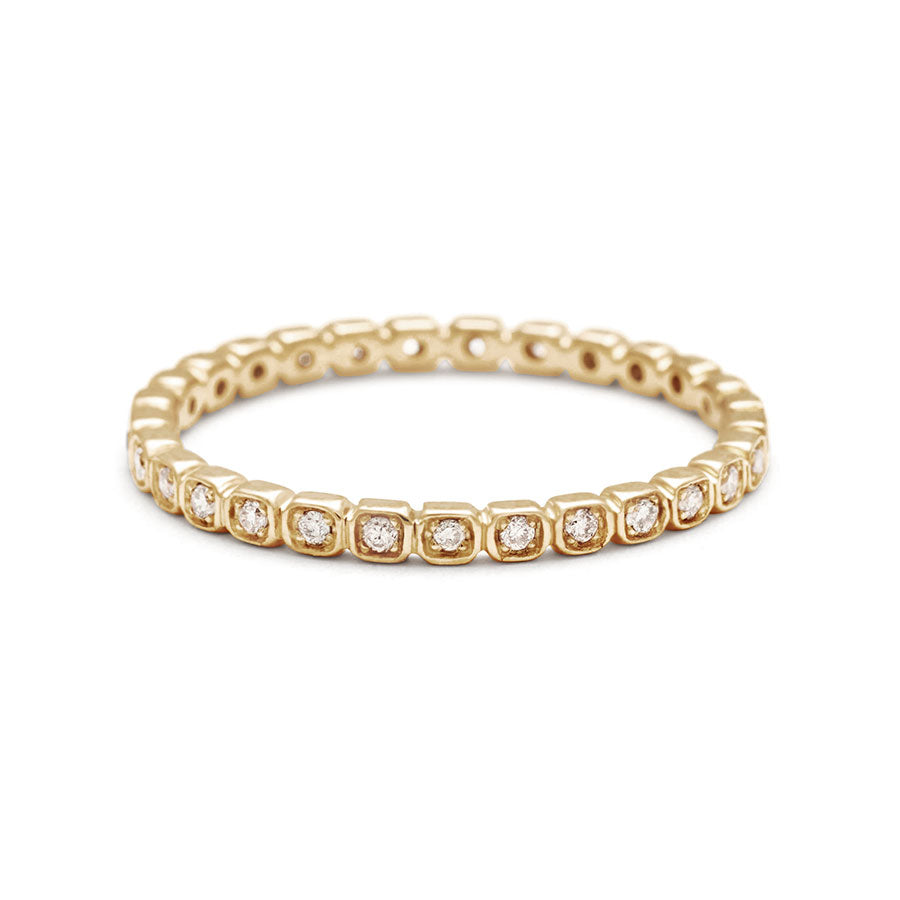 A straight band with tiny white diamonds set in eternity around the band set in yellow gold., Yellow Gold