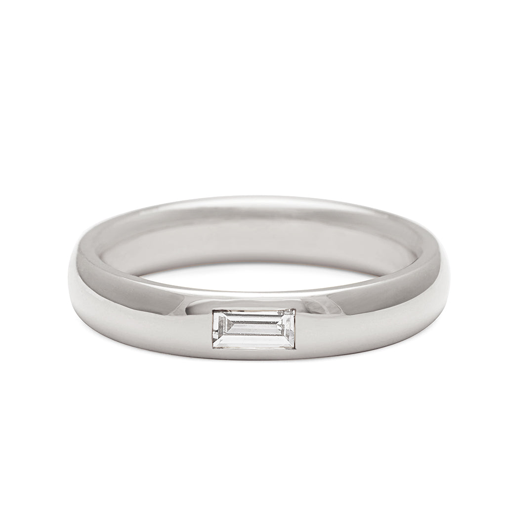 A 4mm classic round band with a white diamond baguette stone set in white gold, White Gold