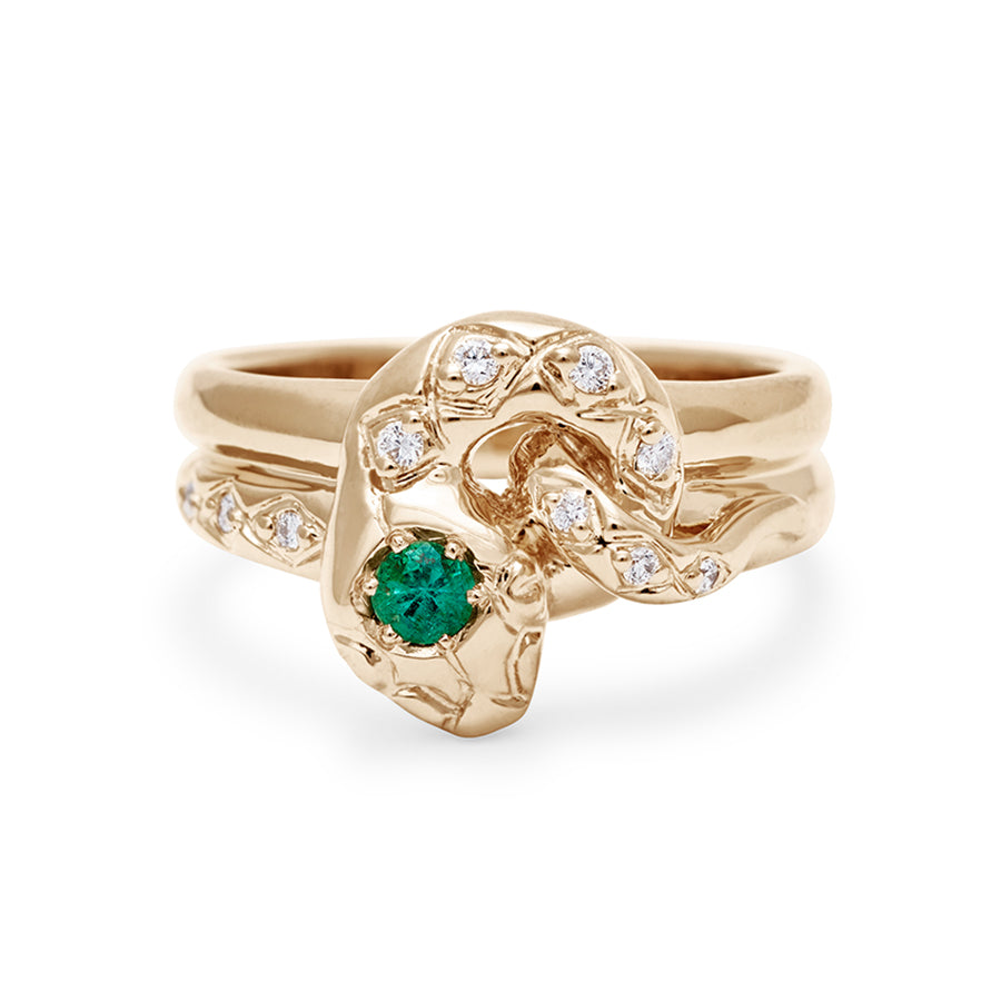 A serpent band with a green emerald center stone and white diamond accent stones around the head of the snake set in yellow gold., Yellow Gold