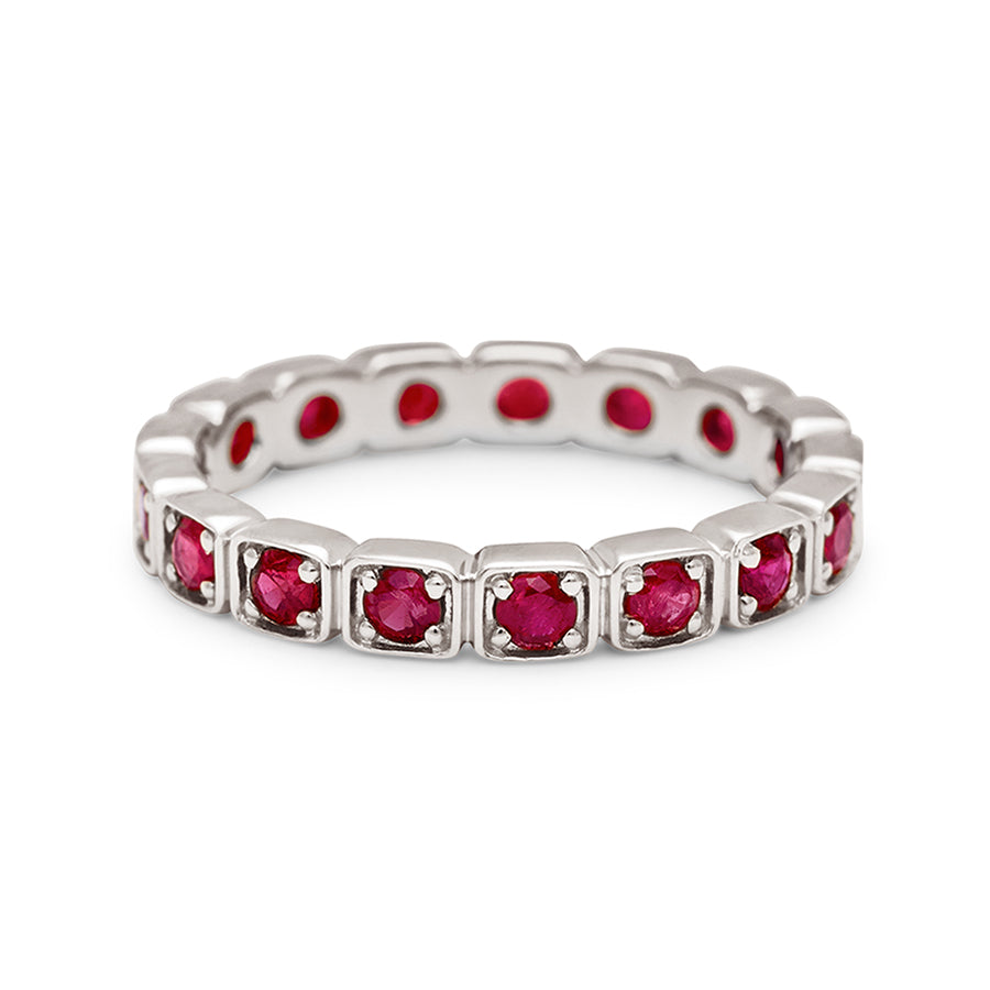 A 3mm straight band with rubies set in eternity around the band set in white gold., White Gold
