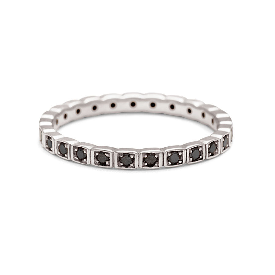 A straight band with black diamonds set in eternity around the band set in white gold., White Gold