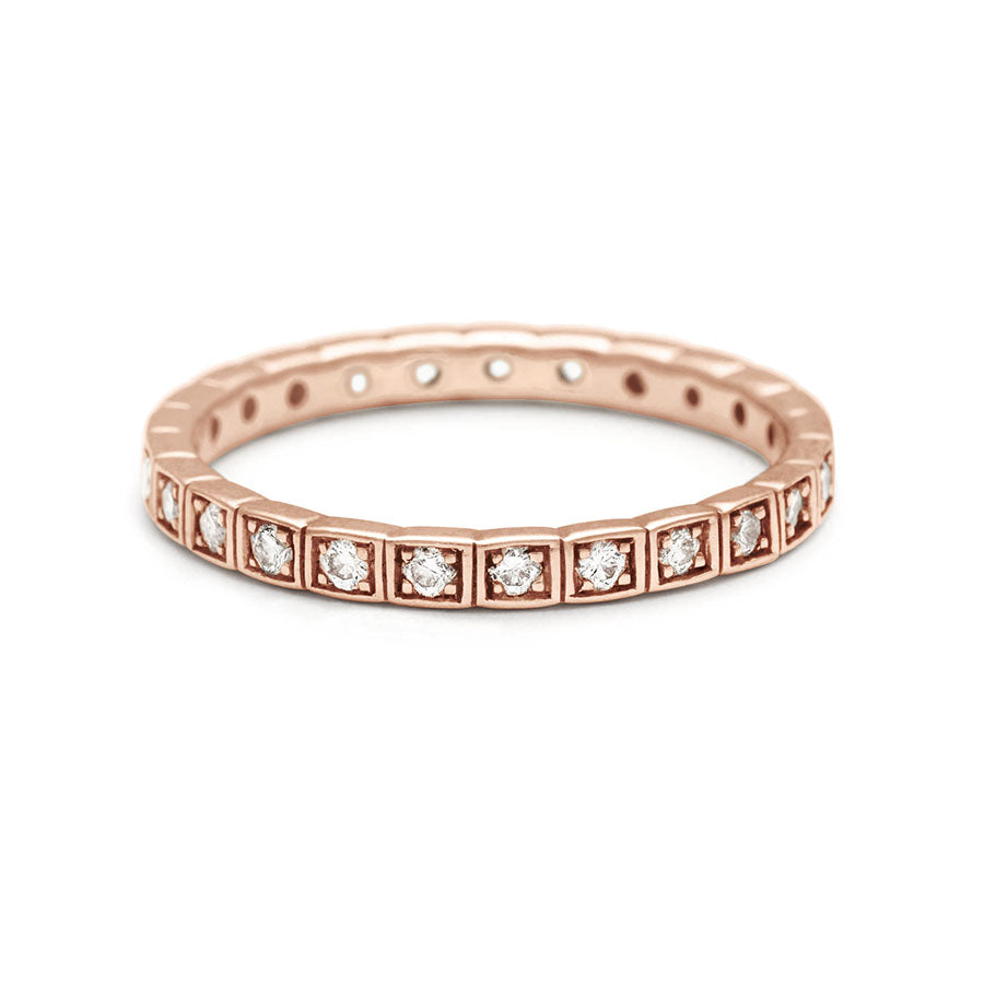 A straight band with white diamonds set in eternity around the band set in rose gold., Rose Gold