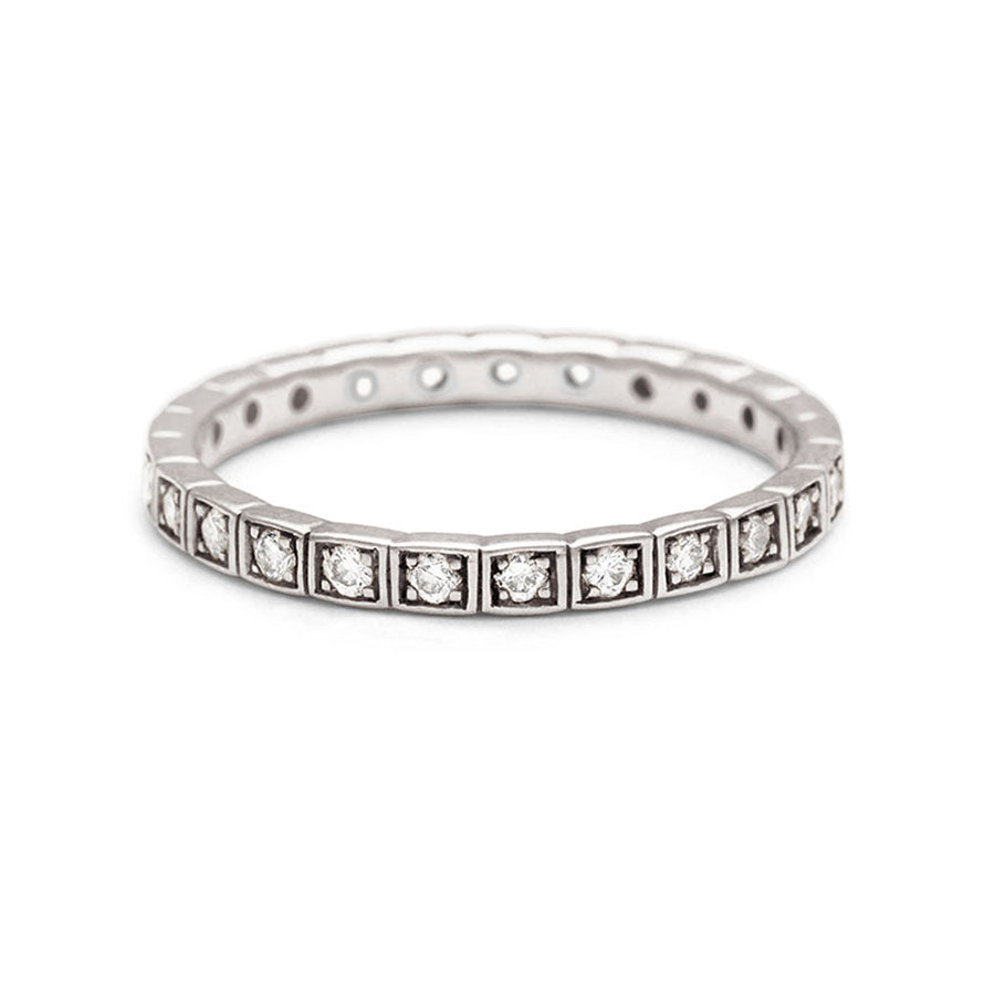 A straight band with white diamonds set in eternity around the band set in white gold., White Gold