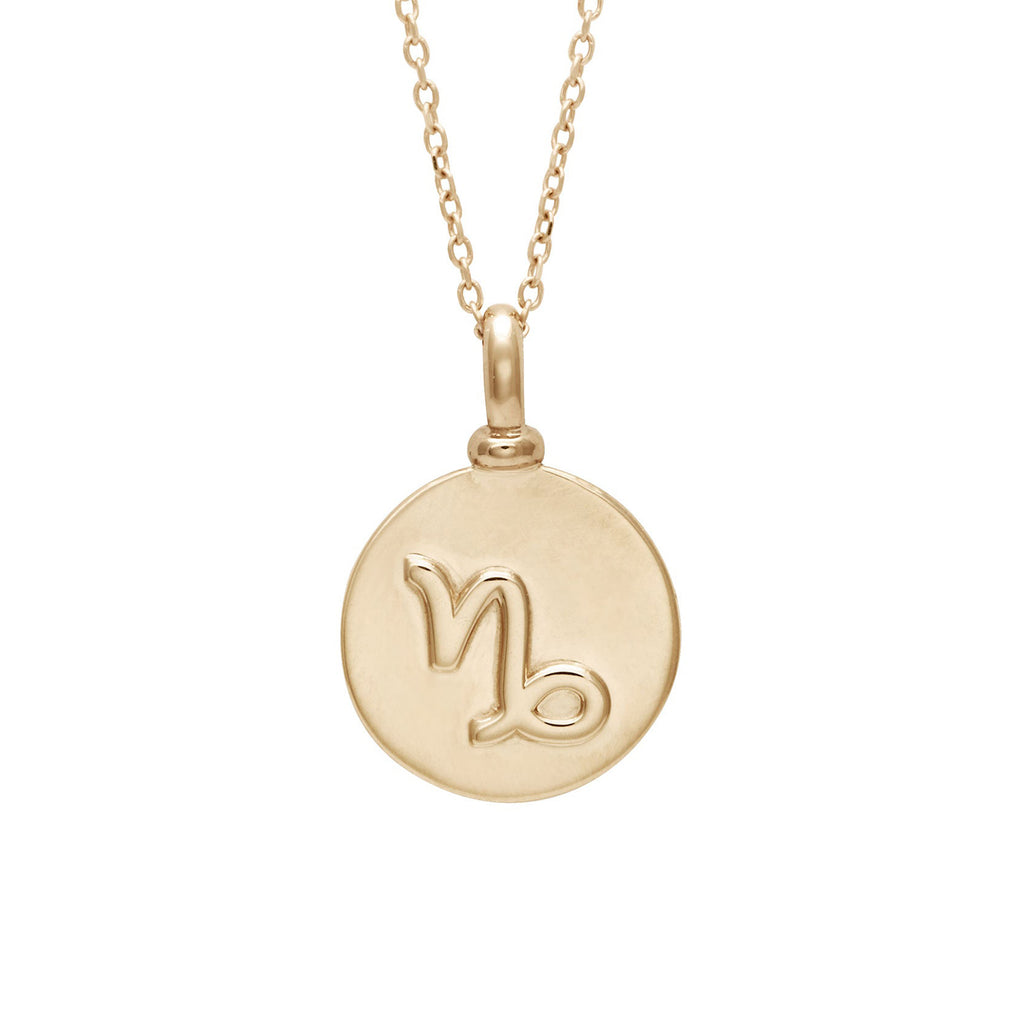 A 14mm charm with the Capricorn zodiac sign set in yellow gold on a yellow gold chain.