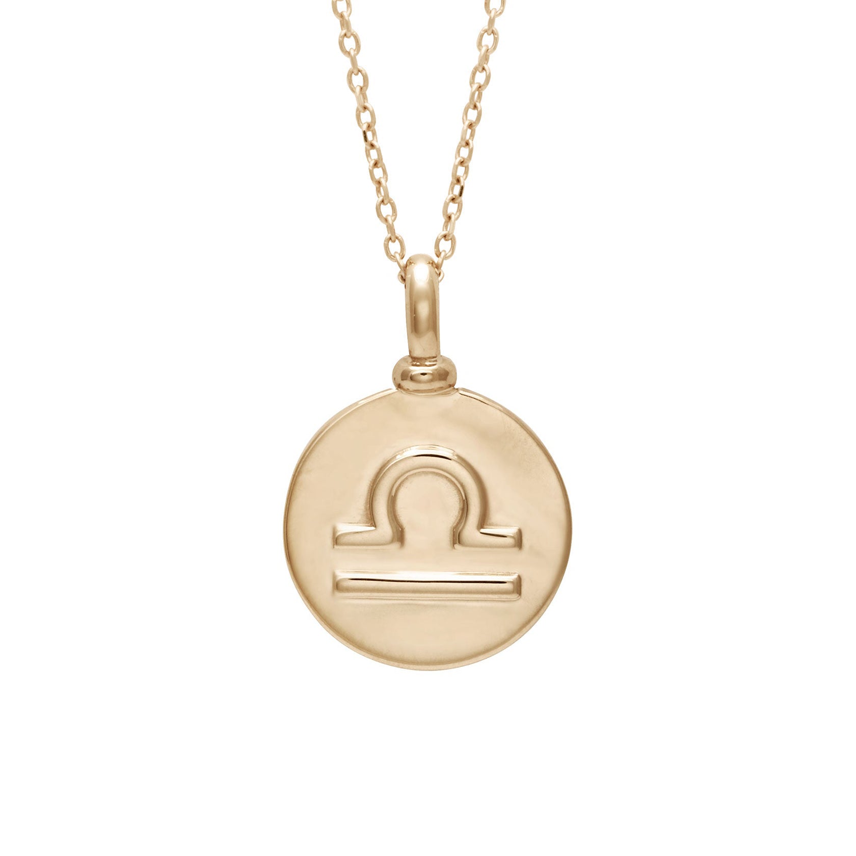 A 14mm charm with the Libra zodiac sign set in yellow gold on a yellow gold chain.