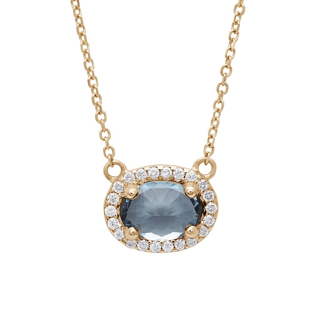 A necklace with an oval shape grey spinel center stone surrounded by a white diamond pave halo set in yellow gold on a yellow gold chain., Yellow Gold