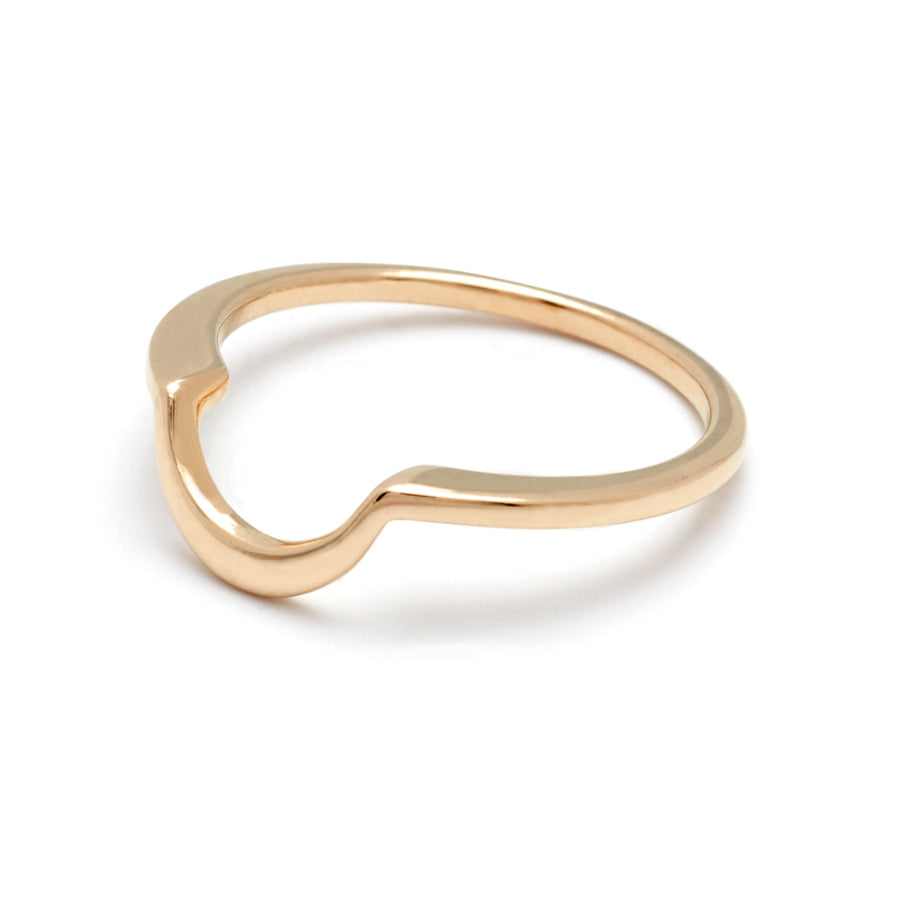 Angled view of a crescent shaped band in solid gold set in yellow gold.