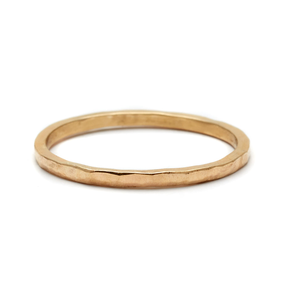 A 1.5mm flat band with a hammered finished set in yellow gold., Yellow Gold