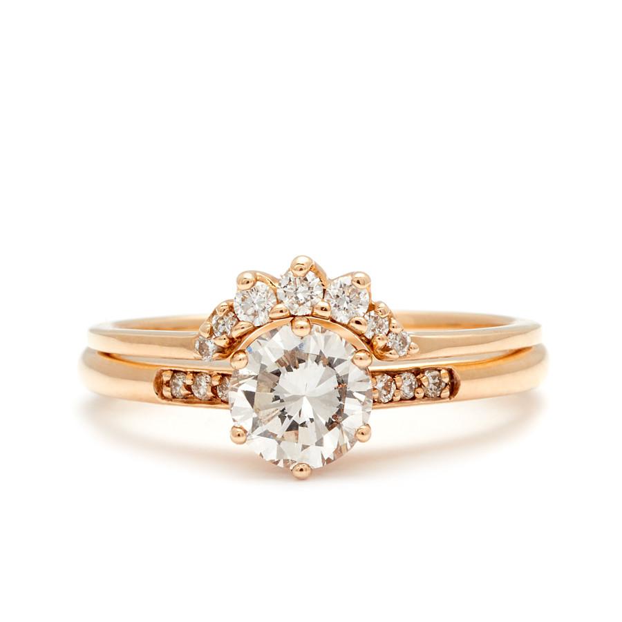 A solitaire ring with a round 1.00ct white diamond with white diamond pave on either side set in yellow gold below a 7 white diamond tiny curve band., White Gold, Rose Gold, Yellow Gold