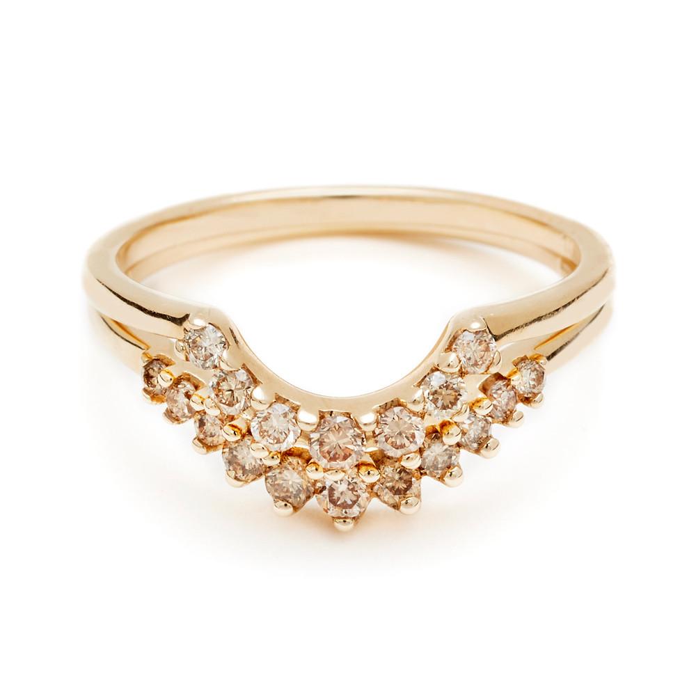 Two curve bands with champagne diamonds set in yellow gold.
