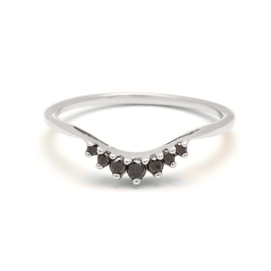 A curved band with 7 black diamonds in ascending and descending size set in white gold., White Gold