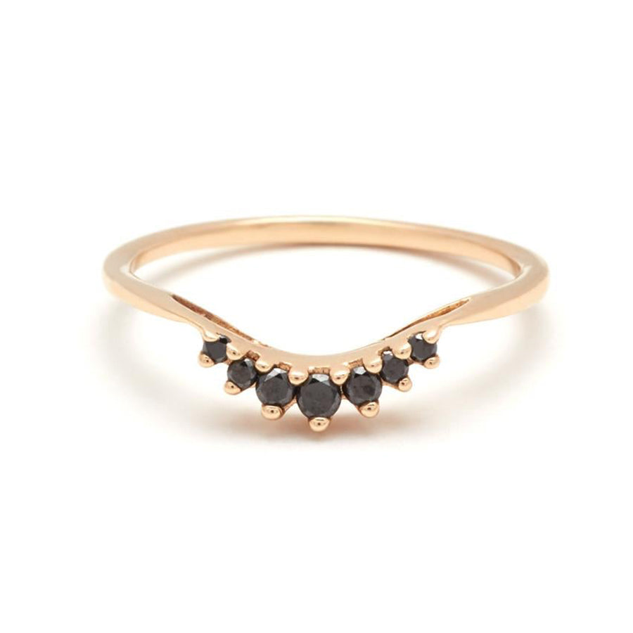 A curved band with 7 black diamonds in ascending and descending size set in yellow gold., Yellow Gold