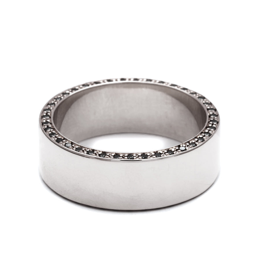 A 7mm flat band with black diamond accents around the band set in white gold., White Gold