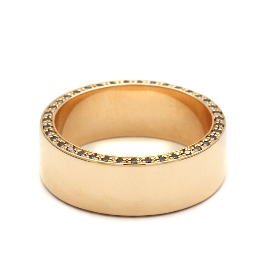 A 7mm flat band with black diamond accents around the band set in yellow gold., Yellow Gold